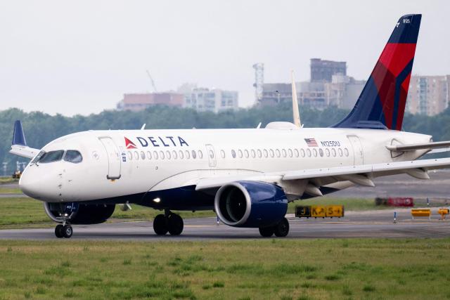 (FILES) A Delta Air Lines Airbus A220 airplane prepares to takeoff at Ronald Reagan Washington National Airport in Arlington, Virginia, on July 10, 2025. The American airline Delta Air Lines has placed a firm order for 31 new long-haul aircraft with Airbus, the European aircraft manufacturer announced on January 28, 2026. (Photo by SAUL LOEB / AFP)
