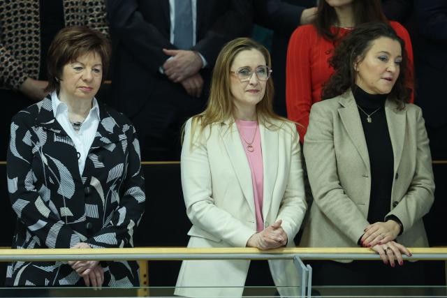 Kati Schulze (C), the wife of Saxony-Anhalt's incoming State Premier, attends a session at Saxony-Anhalt's State Parliament, on January 28, 2026 in Magdeburg, eastern Germany, during the election of the new regional leader. After roughly 15 years in office, Haseloff will not run in Saxony-Anhalt's state elections scheduled on September 6, 2026. (Photo by Ronny HARTMANN / AFP)