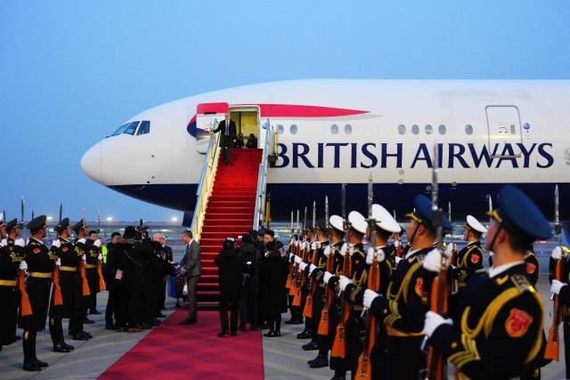 Britain's Prime Minister Keir Starmer alights from his aircraft upon his arrival at an airport in Beijing on January 28, 2026. British Prime Minister Keir Starmer arrived in Beijing on January 28 to meet with Chinese leader Xi Jinping, hoping to restore long fraught relations. (Photo by Carl Court / POOL / AFP)