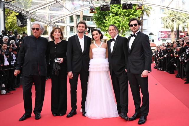 (FILES) (From L) French producer Laurent Petin, French producer Michele Petin, French actor Aubry Dullin, US actress Zoey Deutch, US director Richard Linklater and French actor Guillaume Marbeck arrive for the screening of the film "Nouvelle Vague" (New Wave) at the 78th edition of the Cannes Film Festival in Cannes, southern France, on May 17, 2025. “Nouvelle Vague,” a film by US director Richard Linklater about the legendary shooting of Jean-Luc Godard's film “Breathless,” is leading the race for the 51st Cesar Awards with ten nominations, the Academy announced on January18, 2026. (Photo by Bertrand GUAY / AFP)