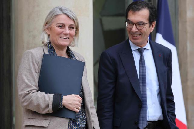 France's Health Minister Stephanie Rist and France's Labour Minister Jean-Pierre Farandou leave after attending the weekly cabinet meeting at The Elysee Presidential Palace, in Paris, on January 28, 2026. (Photo by Ludovic MARIN / AFP)
