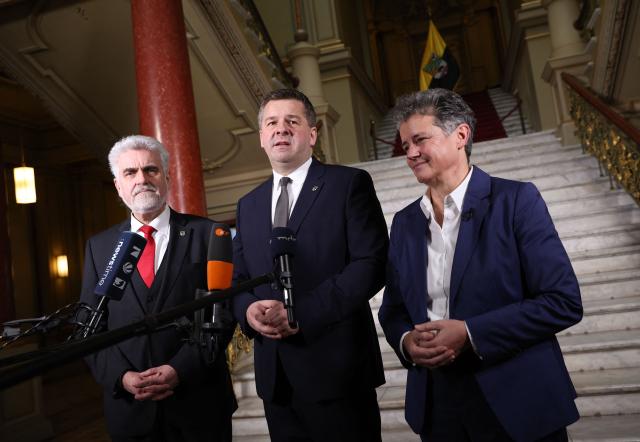 (L-R) Saxony-Anhalt's Economy Minister Armin Willingmann, Saxony-Anhalt's new State Premier Sven Schulze and Saxony-Anhalt's Minister for Infrastructure Lydia Huesgens give a statement at Saxony-Anhalt's State Parliament, on January 28, 2026 in Magdeburg, eastern Germany, after Schulze was elected as the new regional leader. After roughly 15 years in office, Haseloff will not run in Saxony-Anhalt's state elections scheduled on September 6, 2026. (Photo by Ronny HARTMANN / AFP)