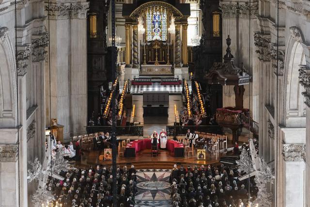 This general view shows Sarah Mullally (C-back to camera) taking part in her 'Confirmation of Election' ceremony to legally confirm her position as the new Archbishop of Canterbury, at St Paul’s Cathedral in London on January 28, 2026. Sarah Mullally, a former nurse, was named to become the first female Archbishop of Canterbury last October, pledging to improve safety at the Church of England following an abuse scandal that ousted her predecessor. (Photo by Gareth Fuller / POOL / AFP)