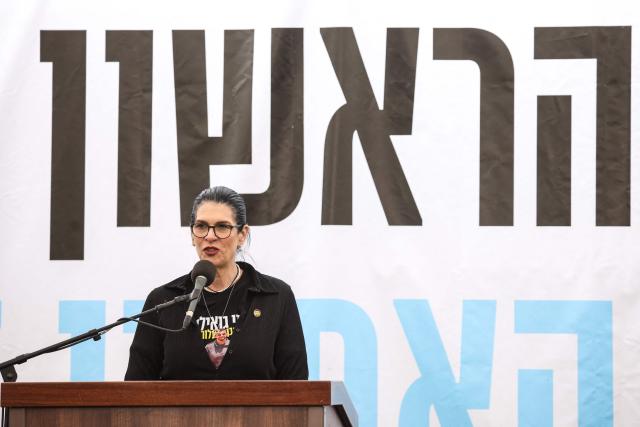 Talik Gvili, the mother of Israeli hostage Ran Gvili, whose remains were finally brought back to Israel on January 26, speaks during his funeral ceremony in the southern town of Meitar on January 28, 2026. Grieving relatives of Ran Gvili gathered on January 28, 2026, as Israel prepared to bury the last hostage returned from Gaza, marking the end of a painful national saga triggered by Hamas's 2023 attack. Israeli forces on January 26 brought home the remains of Gvili, a police officer who was killed in action during Hamas's attack on October 7, 2023 which triggered the devastating war in Gaza. (Photo by ilia yefimovich / AFP)