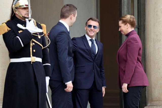France's President Emmanuel Macron (2nd R) welcomes Greenland’s Prime Minister Jens-Frederik Nielsen (2nd L) and Denmark's Prime Minister Mette Frederiksen (R) for a working lunch at the Elysee Palace in Paris, on January 28, 2026. (Photo by Ludovic MARIN / AFP)