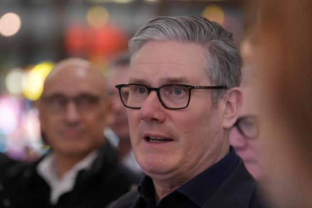 Britain's Prime Minister Keir Starmer delivers remarks to the business delegation at a hotel in Beijing on January 28, 2026. British Prime Minister Keir Starmer arrived in Beijing on January 28 to meet with Chinese leader Xi Jinping, hoping to restore long fraught relations. (Photo by Kin Cheung / POOL / AFP)