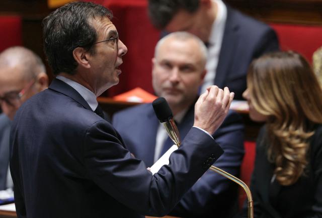 France's Labour Minister Jean-Pierre Farandou (L) speaks during a session of questions to the government at The National Assembly, France's lower house parliament, in Paris on January 28, 2026. (Photo by Thomas SAMSON / AFP)