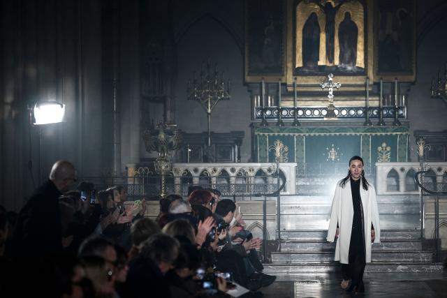 Japanese fashion designer Yuima Nakazato acknowledges the audience at the end of the Yuima Nakazato Women's Haute Couture Spring/Summer 2026 collection fashion show at The American Cathedral as part of the Paris Haute Couture Fashion Week, in Paris, on January 28, 2026. (Photo by Sebastien DUPUY / AFP)