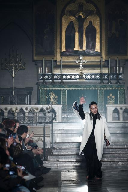 Japanese fashion designer Yuima Nakazato acknowledges the audience at the end of the Yuima Nakazato Women's Haute Couture Spring/Summer 2026 collection fashion show at The American Cathedral as part of the Paris Haute Couture Fashion Week, in Paris, on January 28, 2026. (Photo by Sebastien DUPUY / AFP)