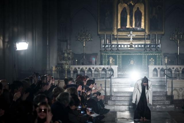 Japanese fashion designer Yuima Nakazato acknowledges the audience at the end of the Yuima Nakazato Women's Haute Couture Spring/Summer 2026 collection fashion show at The American Cathedral as part of the Paris Haute Couture Fashion Week, in Paris, on January 28, 2026. (Photo by Sebastien DUPUY / AFP)