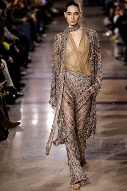 A model presents a creation by Elie Saab for the Women's Haute Couture Spring/Summer 2026 collection fashion show as part of the Paris Haute Couture Fashion Week, in Paris, on January 28, 2026. (Photo by GEOFFROY VAN DER HASSELT / AFP)