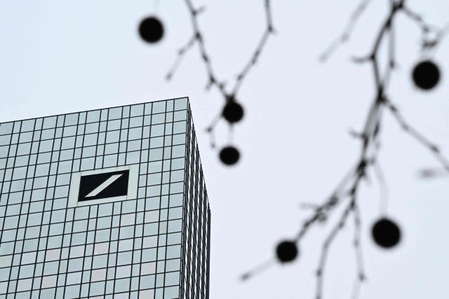 Partial view of the Deutsche Bank headquarters is taken in Frankfurt am Main, on January 28, 2028, as German prosecutors and police on searched the bank's headquarters in an investigation over suspected money laundering offences, officials said. According to the Sueddeutsche Zeitung newspaper, the probe is connected to suspected offences in the bank's dealings with companies linked to Russian billionaire businessman Roman Abramovich. Prosecutors confirmed the raids but did not say who was being targeted. (Photo by Kirill KUDRYAVTSEV / AFP)