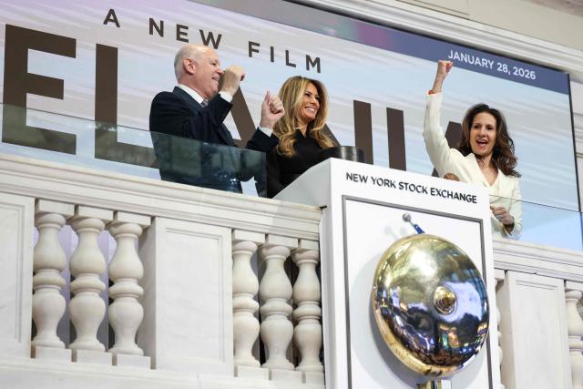 US First Lady Melania Trump (C), joined by NYSE President Lynn Smith (R) and Chairperson of Intercontinental Exchange Jeffrey Sprecher (L), rings the opening bell at the New York Stock Exchange (NYSE) in New York on January 28, 2026. (Photo by ANGELA WEISS / AFP)