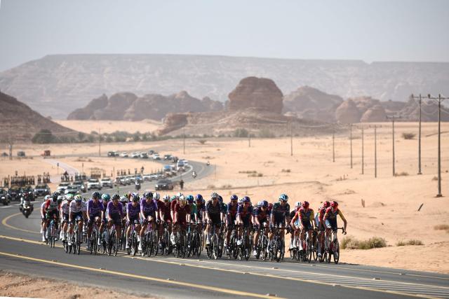 The pack rides in the second stage of the AlUla Tour cycling race, 152km from AlManshiyah Train Station to AlManshiyah Train Station on January 28, 2026. (Photo by Anne-Christine POUJOULAT / AFP)