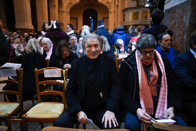 French TV host Michel Drucker (C) attends a memorial mass for late French actress Brigitte Bardot at Saint-Roch church in Paris, on January 28, 2026. (Photo by JULIEN DE ROSA / AFP)