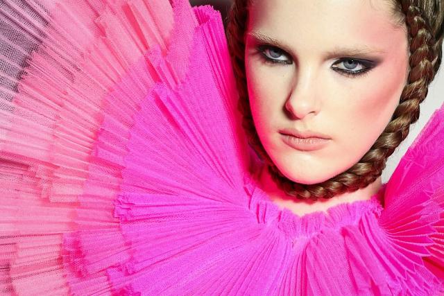 A model gets ready in the backstage prior to present a creation for the Viktor and Rolf Women's Haute Couture Spring/Summer 2026 collection fashion show as part of the Paris Haute Couture Fashion Week, in Paris, on January 28, 2026. (Photo by Alain JOCARD / AFP)
