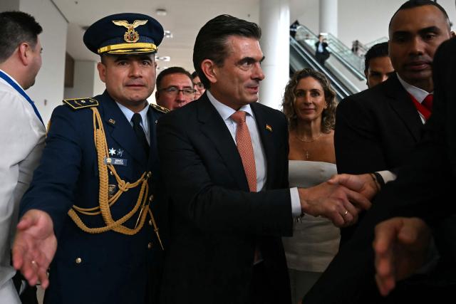 Bolivia's President Rodrigo Paz leaves after the inauguration of the Latin America and the Caribbean International Economic Forum at the Panama Convention Center in Panama City on January 28, 2026. The Latin America and Caribbean International Economic Forum 2026, organized by CAF (the Development Bank of Latin America and the Caribbean) in partnership with the Government of Panama, brings together business leaders and regional figures. (Photo by MARTIN BERNETTI / AFP)