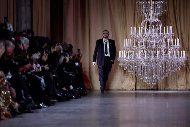 Lebanese fashion designer Zuhair Murad acknowledges the audience during the Zuhair Murad Women's Haute Couture Spring/Summer 2026 collection fashion show as part of the Paris Haute Couture Fashion Week, in Paris, on January 28, 2026. (Photo by Sebastien DUPUY / AFP)