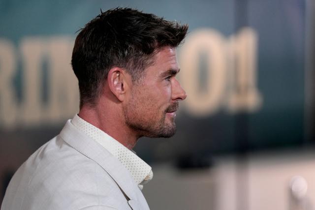 Australian Actor Chris Hemsworth poses on the red carpet upon arrival to attend the European Gala Screening of Crime 101, at the Odeon Luxe in Leicester Square, central London on January 28, 2026. (Photo by CARLOS JASSO / AFP)