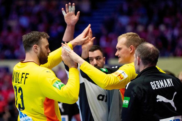 Germany's goalkeeper #01 David Spaeth (2nd R) and Germany's goalkeeper #33 Andreas Wolff (L) during a timeout at the men's EHF Euro 2026 main round handball match Germany vs France in Herning, Denmark, on January 28, 2026. (Photo by Bo Amstrup / Ritzau Scanpix / AFP) / Denmark OUT