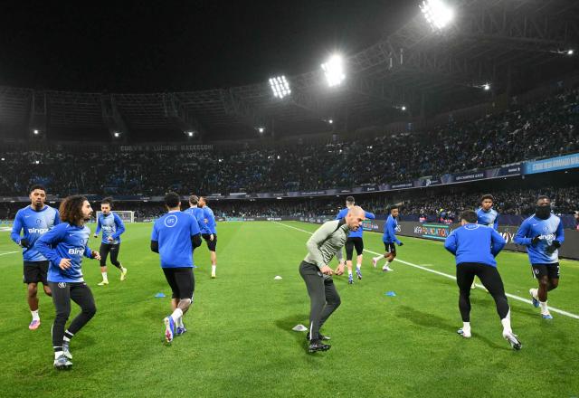 Chelsea's players warm up before the UEFA Champions League - league phase day 8 football match between Napoli and Chelsea at the Diego Armando Maradona stadium in Naples on January 28, 2026. (Photo by Alberto PIZZOLI / AFP)