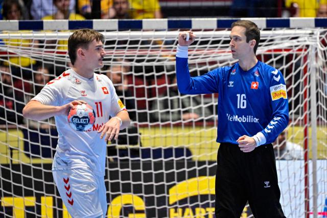Switzerland's centre back #11 Felix Aellen (L) and Switzerland's goalkeeper #16 Nikola Portner react during the men's EHF Euro 2026 main round handball match Switzerland v Sweden in Malmoe, Sweden, on January 28, 2026. (Photo by Johan Nilsson/TT / TT NEWS AGENCY / AFP) / Sweden OUT