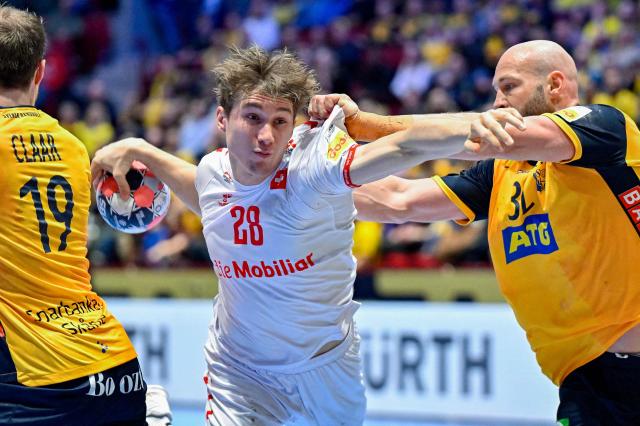 Switzerland's centre back #28 Luca Sigrist (C) vies during the men's EHF Euro 2026 main round handball match Switzerland v Sweden in Malmoe, Sweden, on January 28, 2026. (Photo by Johan NILSSON / TT NEWS AGENCY / AFP) / Sweden OUT