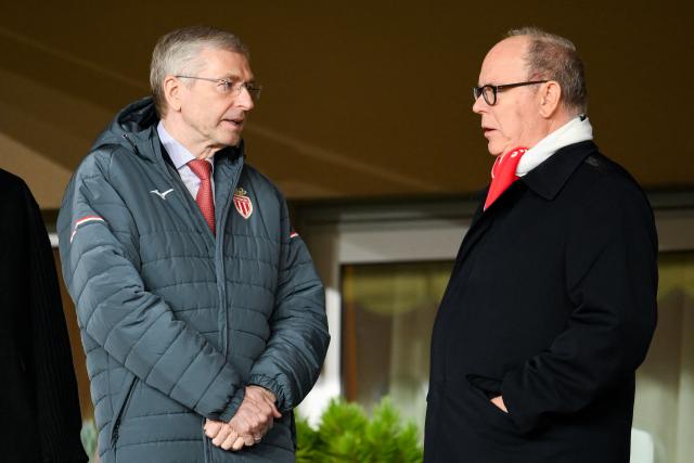 Prince Albert II of Monaco (R) speaks with AS Monaco's Russian President Dmitry Rybolovlev ahead of the UEFA Champions League league phase day 8 football match between AS Monaco and Juventus at the Stade Louis II in the Principality of Monaco on January 28, 2026. (Photo by FREDERIC DIDES / AFP)