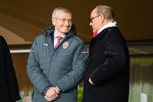 Prince Albert II of Monaco (R) speaks with AS Monaco's Russian President Dmitry Rybolovlev ahead of the UEFA Champions League league phase day 8 football match between AS Monaco and Juventus at the Stade Louis II in the Principality of Monaco on January 28, 2026. (Photo by FREDERIC DIDES / AFP)