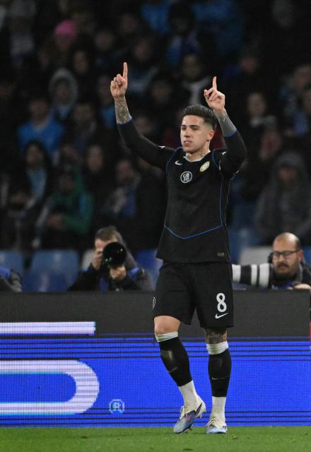 Chelsea's Argentinian midfielder #08 Enzo Fernandez celebrates after scoring a penalty kick during the UEFA Champions League - league phase day 8 football match between Napoli and Chelsea at the Diego Armando Maradona stadium in Naples on January 28, 2026. (Photo by Andreas SOLARO / AFP)