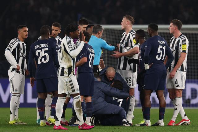 Paris Saint-Germain's Georgian forward #07 Khvicha Kvaratskhelia (down) receives medical assistance after an injury  during the UEFA Champions League - League phase, Matchday 8 - football match between Paris Saint-Germain (PSG) and Newcastle United FC at the Parc des Princes stadium in Paris on January 28, 2026. (Photo by FRANCK FIFE / AFP)