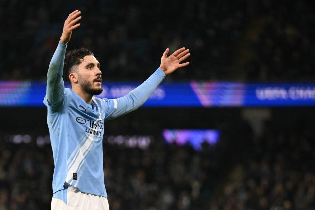 Manchester City's French midfielder #10 Rayan Cherki celebrates scoring the team's second goal during the UEFA Champions League football match between Manchester City and Galatasaray at the Etihad Stadium in Manchester, north west England, on January 28, 2026. (Photo by Oli SCARFF / AFP)