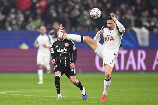 Frankfurt's German midfielder #27 Mario Goetze and Tottenham Hotspur's Portugese midfielder #06 Joao Palhinha vie for the ball during the UEFA Champions League league phase- day 8 football match between Eintracht Frankfurt and Tottenham Hotspur in Frankfurt, western Germany, on January 28, 2026. (Photo by Kirill KUDRYAVTSEV / AFP)