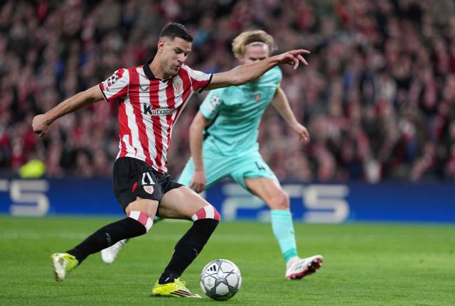 TOPSHOT - Athletic Bilbao's Spanish forward #11 Gorka Guruzeta scores his team's second goal during the UEFA Champions League league phase day 8 football match between Athletic Club Bilbao and Sporting CP at San Mames Stadium in Bilbao on January 28, 2026. (Photo by Cesar MANSO / AFP)