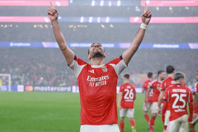 Benfica's Greek forward #14 Vangelis Pavlidis celebrates scoring his team's second goal during the UEFA Champions League league phase day 8 football match between SL Benfica and Real Madrid CF at Estadio da Luz in Lisbon on January 28, 2026. (Photo by PATRICIA DE MELO MOREIRA / AFP)