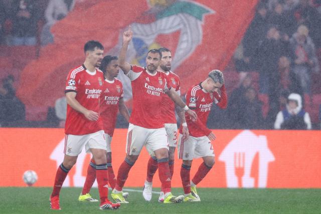 Benfica's Greek forward #14 Vangelis Pavlidis (C) celebrates scoring his team's second goal during the UEFA Champions League league phase day 8 football match between SL Benfica and Real Madrid CF at Estadio da Luz in Lisbon on January 28, 2026. (Photo by FILIPE AMORIM / AFP)