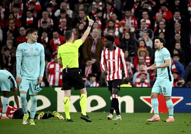 Sporting Lisbon's Portuguese forward #08 Pedro Goncalves is shown a yellow card during the UEFA Champions League league phase day 8 football match between Athletic Club Bilbao and Sporting CP at San Mames Stadium in Bilbao on January 28, 2026. (Photo by ANDER GILLENEA / AFP)