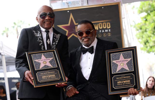US singer-songwriters Ronald Isley (R) and Ernie Isley (L) of US band The Isley Brothers pose during their Hollywood Walk of Fame star ceremony in Hollywood, California on January 28, 2026. (Photo by VALERIE MACON / AFP)