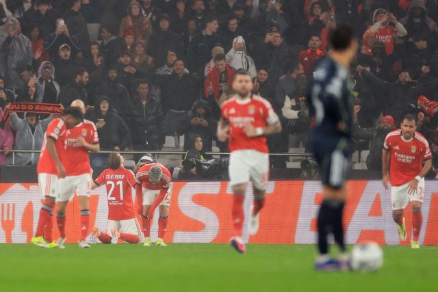 Benfica's Norwegian forward #21 Andreas Schjelderup celebrates scoring his team's third goal during the UEFA Champions League league phase day 8 football match between SL Benfica and Real Madrid CF at Estadio da Luz in Lisbon on January 28, 2026. (Photo by PATRICIA DE MELO MOREIRA / AFP)