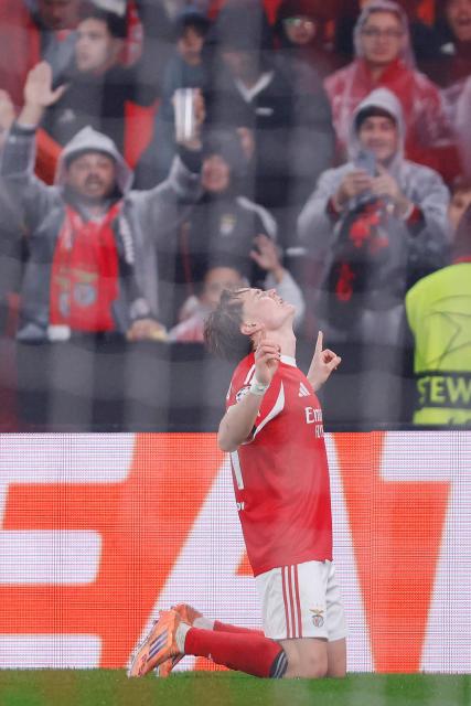Benfica's Norwegian forward #21 Andreas Schjelderup celebrates scoring his team's third goal during the UEFA Champions League league phase day 8 football match between SL Benfica and Real Madrid CF at Estadio da Luz in Lisbon on January 28, 2026. (Photo by FILIPE AMORIM / AFP)