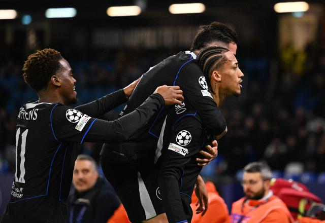 Chelsea's Brazilian striker #20 Joao Pedro celebrates scoring his team's second goal during the UEFA Champions League - league phase day 8 football match between Napoli and Chelsea at the Diego Armando Maradona stadium in Naples on January 28, 2026. (Photo by Andreas SOLARO / AFP)