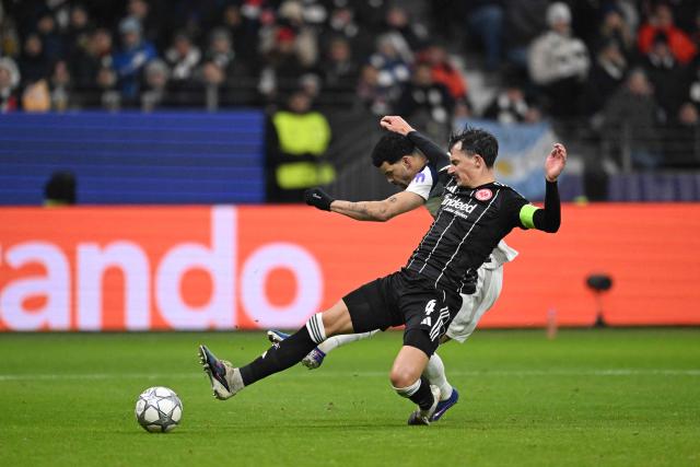Tottenham Hotspur's English forward #19 Dominic Solanke scores his team's second goal during the UEFA Champions League league phase- day 8 football match between Eintracht Frankfurt and Tottenham Hotspur in Frankfurt, western Germany, on January 28, 2026. (Photo by Kirill KUDRYAVTSEV / AFP)
