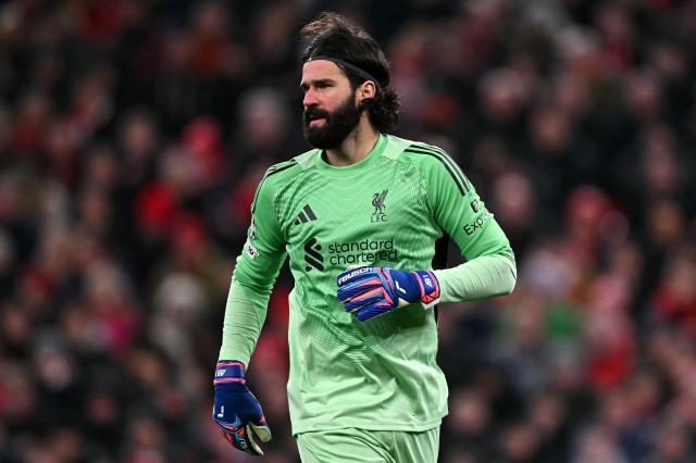 Liverpool's Brazilian goalkeeper #01 Alisson Becker looks on during the UEFA Champions League football match between Liverpool and Qarabag at Anfield in Liverpool, north west England on January 28, 2026. (Photo by Paul ELLIS / AFP)