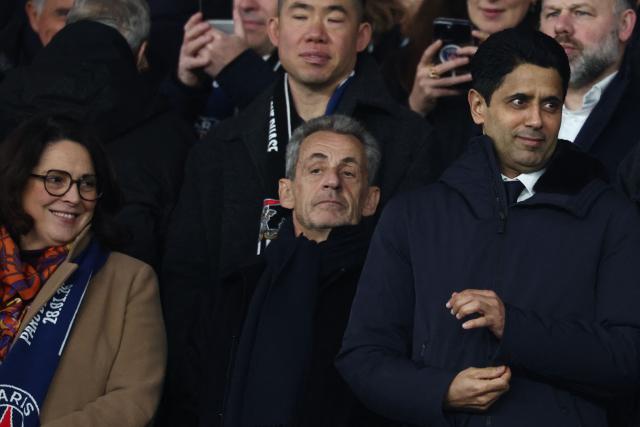 France's Sports Minister Marina Ferrari (L), French former president  Nicolas Sarkozy (C) and Paris Saint Germain's Qatari president  Nasser al-Khelaifi (R) attend the  UEFA Champions League - League phase, Matchday 8 - football match between Paris Saint-Germain (PSG) and Newcastle United FC at the Parc des Princes stadium in Paris on January 28, 2026. (Photo by FRANCK FIFE / AFP)