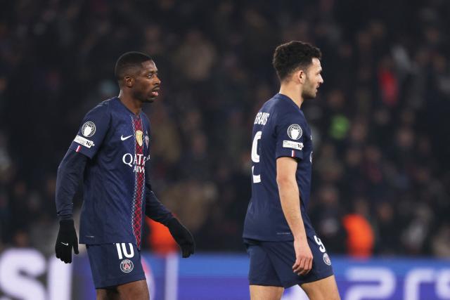 Paris Saint-Germain's French forward #10 Ousmane Dembele (L) and Paris Saint-Germain's Portuguese forward #09 Goncalo Ramos react after a draw in the  UEFA Champions League - League phase, Matchday 8 - football match between Paris Saint-Germain (PSG) and Newcastle United FC at the Parc des Princes stadium in Paris on January 28, 2026. (Photo by FRANCK FIFE / AFP)