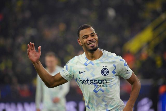 Inter Milan's French midfielder #17 Andy Diouf celebrates after scoring the 0-2 goal during the UEFA Champions League league phase - day 8 football match between BVB Borussia Dortmund and Inter Milan in Dortmund, western Germany, on January 28, 2026. (Photo by Sascha Schuermann / AFP)