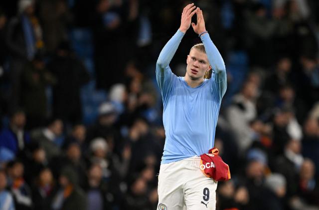Manchester City's Norwegian striker #09 Erling Haaland applauds the fans following the UEFA Champions League football match between Manchester City and Galatasaray at the Etihad Stadium in Manchester, north west England, on January 28, 2026. Manchester city won the match 2-0. (Photo by Oli SCARFF / AFP)