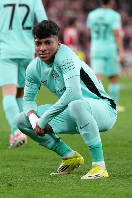 Sporting Lisbon's Brazilian forward #27 Alisson Santos celebrates victory at the end of the UEFA Champions League league phase day 8 football match between Athletic Club Bilbao and Sporting CP at San Mames Stadium in Bilbao on January 28, 2026. (Photo by Cesar MANSO / AFP)