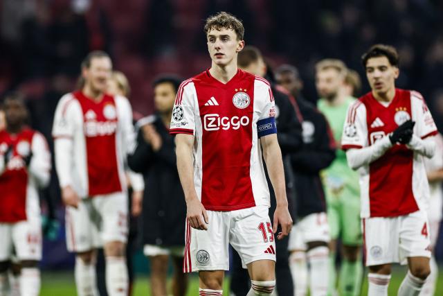 Ajax's Dutch defender #15 Youri Baas (C) reacts at the end of the UEFA Champions League, league phase - matchday 8, football match between Ajax and Olympiakos at the Johan Cruijff Arena, in Amsterdam on January 28, 2026. (Photo by Koen van Weel / ANP / AFP) / Netherlands OUT