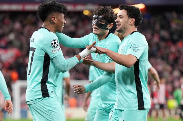 Sporting Lisbon's Brazilian forward #27 Alisson Santos celebrates victory with teamamtes at the end of the UEFA Champions League league phase day 8 football match between Athletic Club Bilbao and Sporting CP at San Mames Stadium in Bilbao on January 28, 2026. (Photo by Cesar MANSO / AFP)